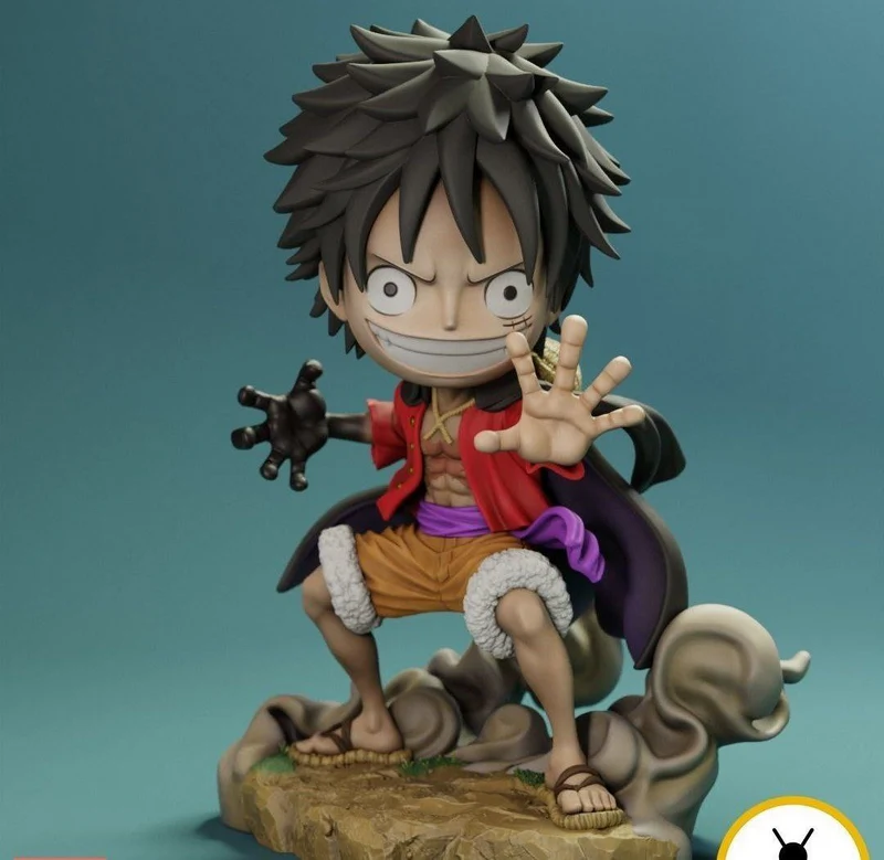 Luffy One Piece fan-art statuette crouching on a rocky base