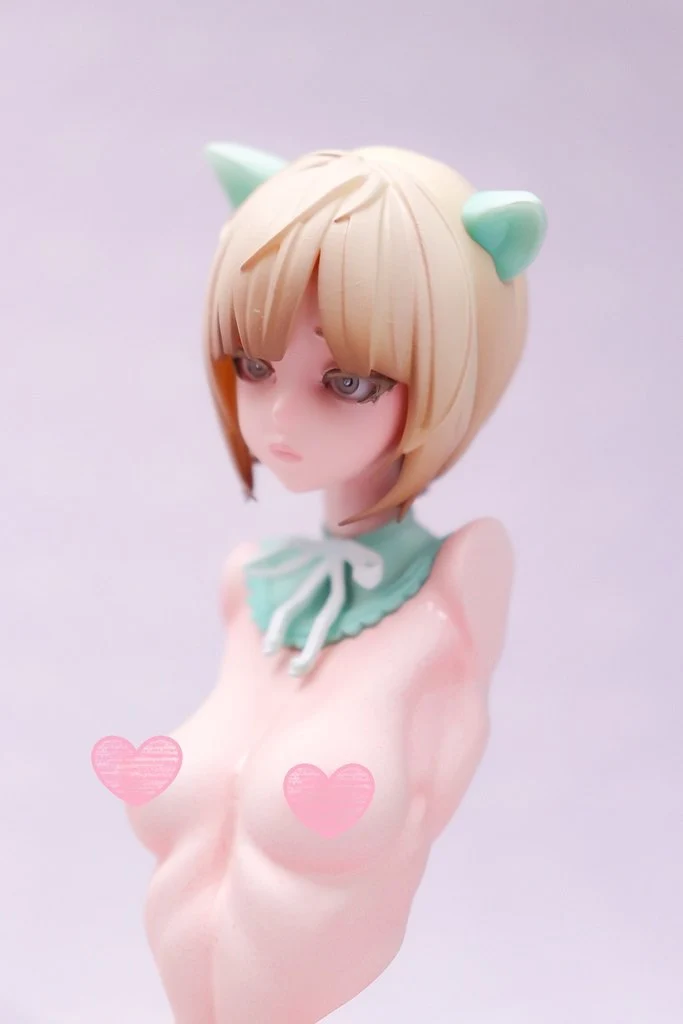 Stylized fox-eared female bust with short blonde hair, large eyes, and a mint-green collar