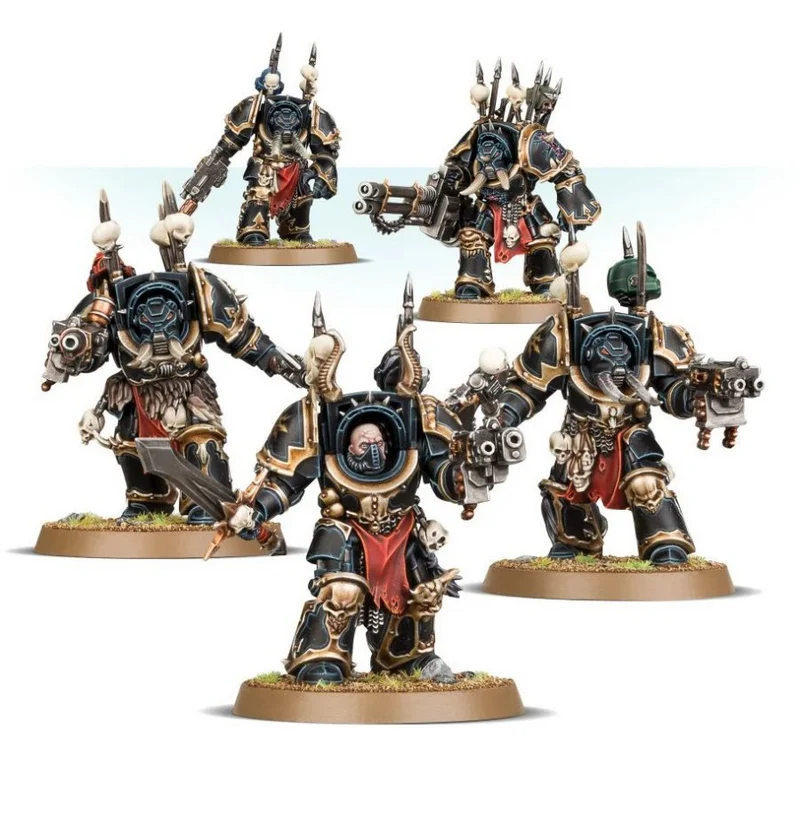 Chaos Terminator miniatures in spiked armor with skull details and heavy weapons