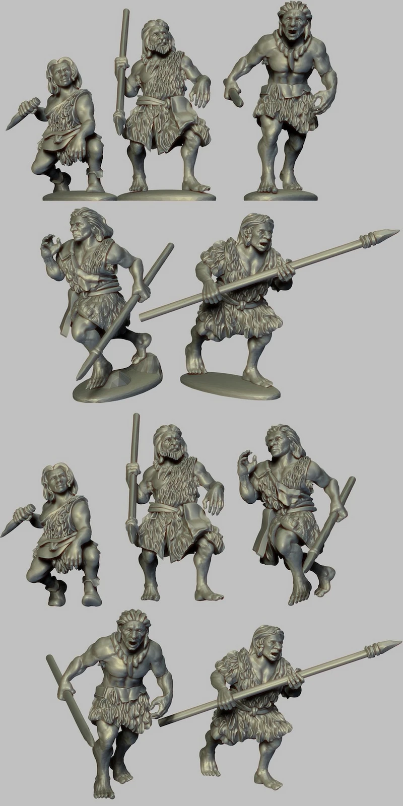 Neanderthal prehistoric miniature figures wearing fur clothing and carrying spears