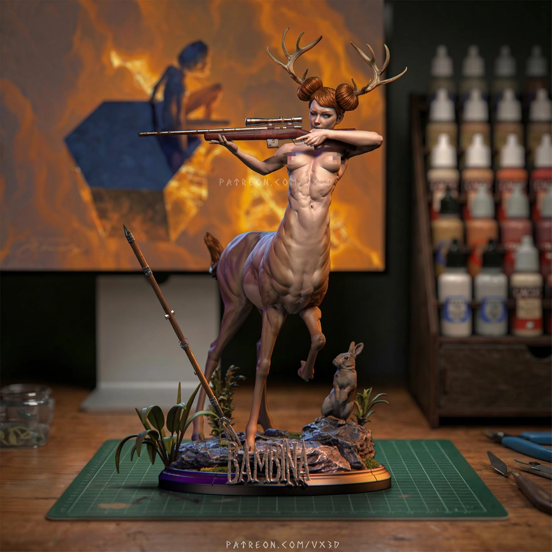 Bambina centaur character figure with antlers, rifle, rabbit, and scenic base
