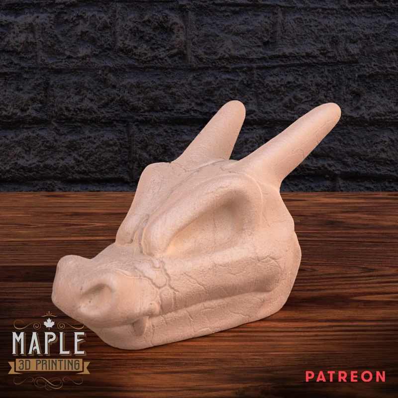 Stylized Charizard skull 3D model with two long upward-sweeping horns
