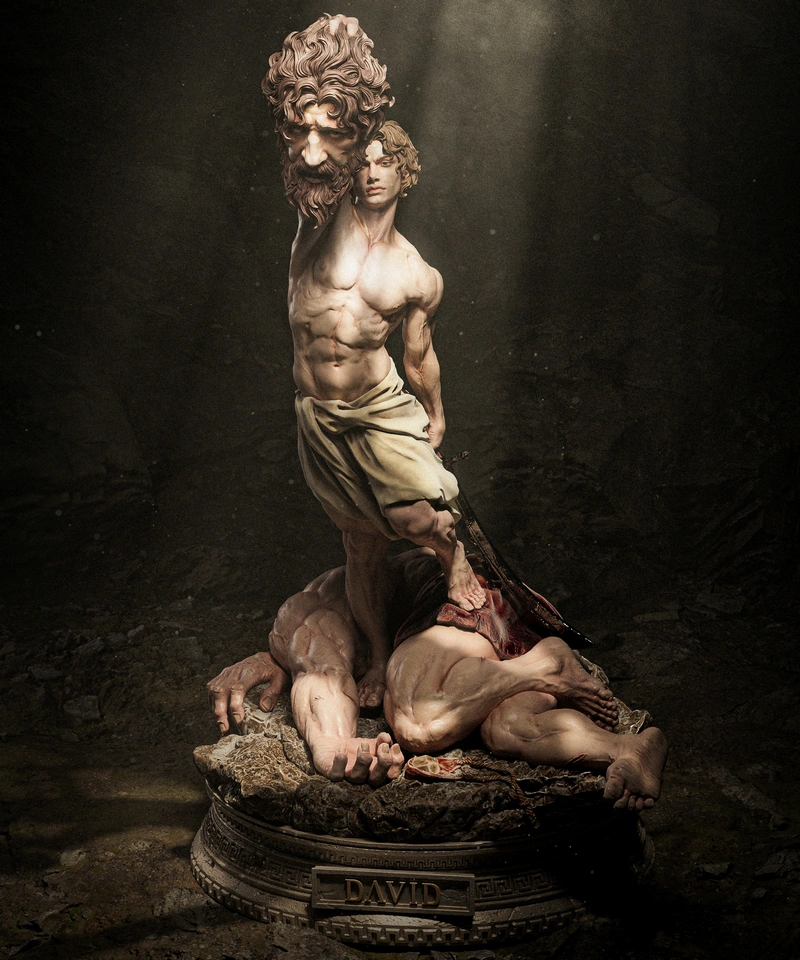 David standing over fallen Goliath in a detailed biblical statue on a rocky base