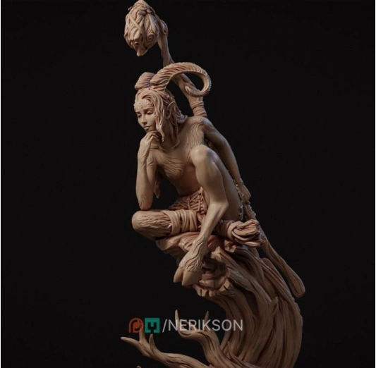 Seated horned faun fantasy statue with curled horns and flowing organic base
