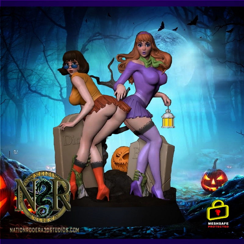 Daphne and Velma Scooby-Doo Halloween display figure with lantern, pumpkin, and tombstones