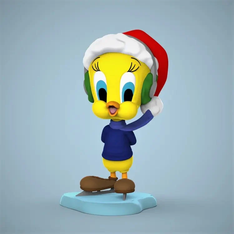 Tweety Looney Tunes figure wearing a Santa hat, earmuffs and scarf on a display base