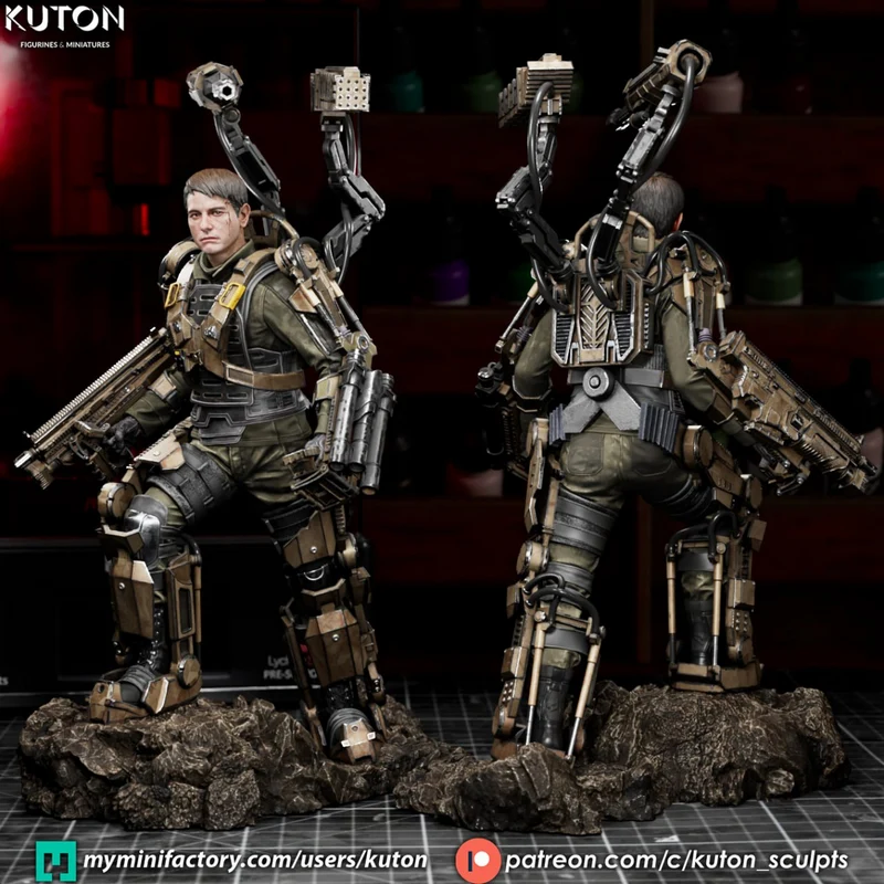 William Cage in a combat exoskeleton with rifle and mechanical support arms