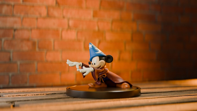 Mickey Mouse as the Sorcerer's Apprentice on a circular display base