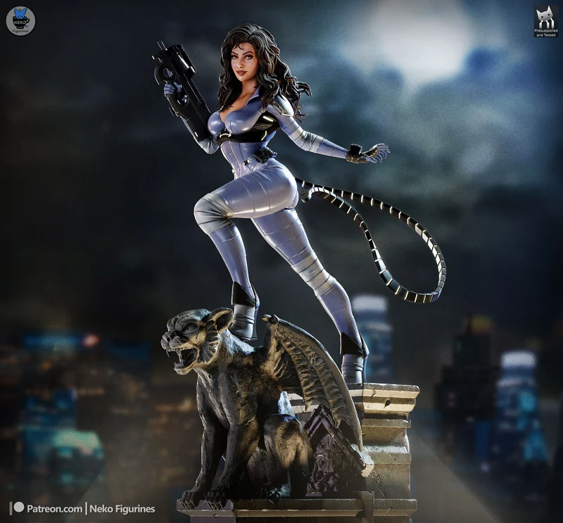 Catwoman Absolute DC statue in a silver suit with whip, gun, and panther companion