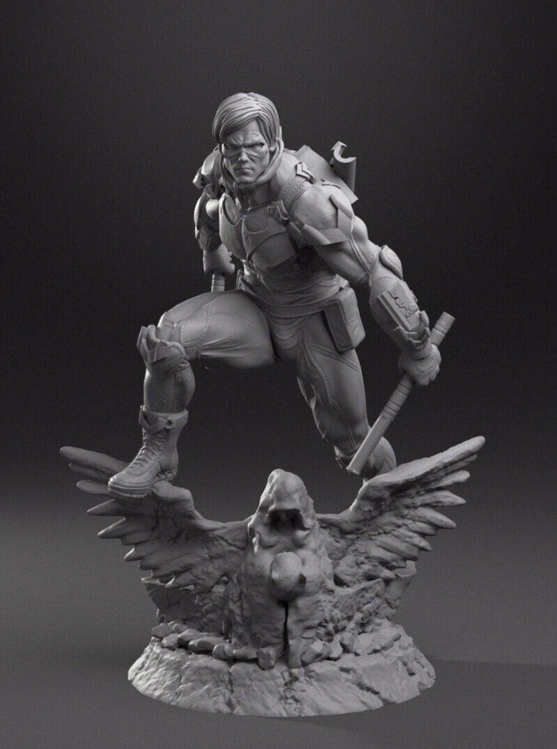Nightwing DC Comics figure holding a staff above a spread-wing bird base