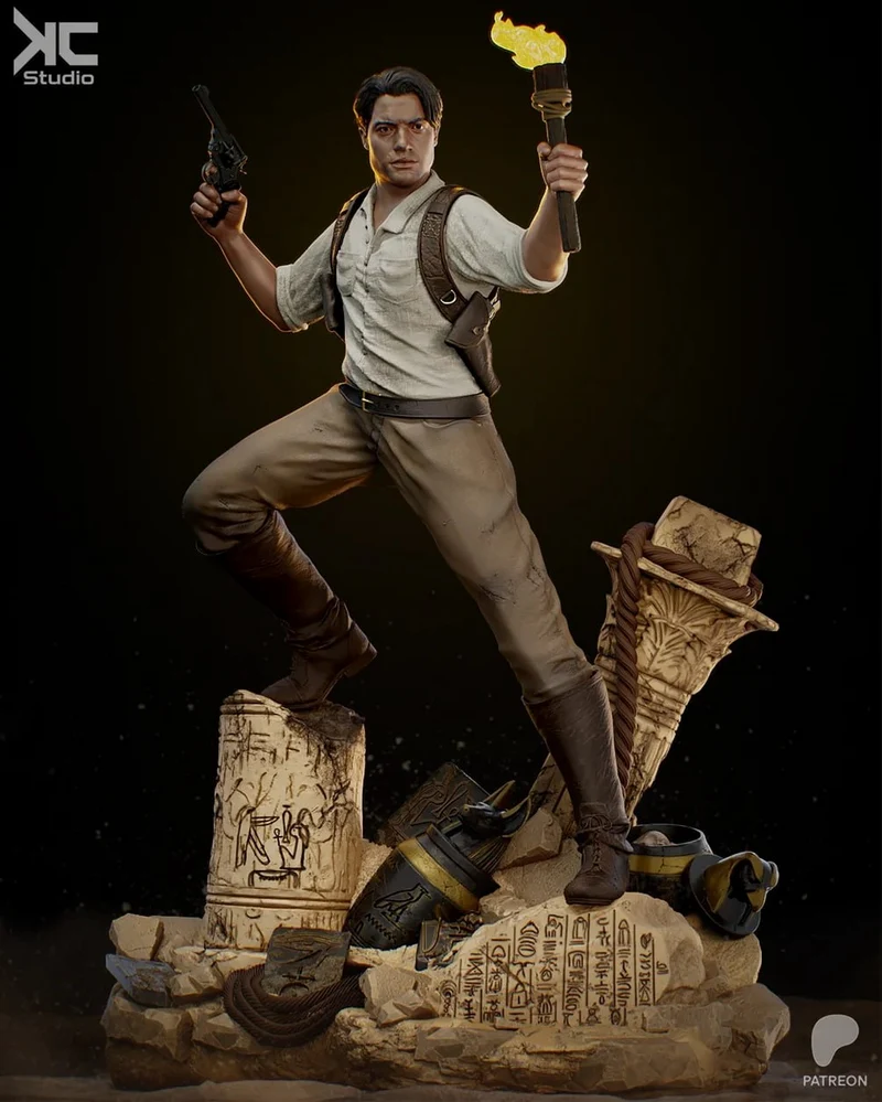Rick O’Connell The Mummy statue holding a torch and pistol on an Egyptian ruin base