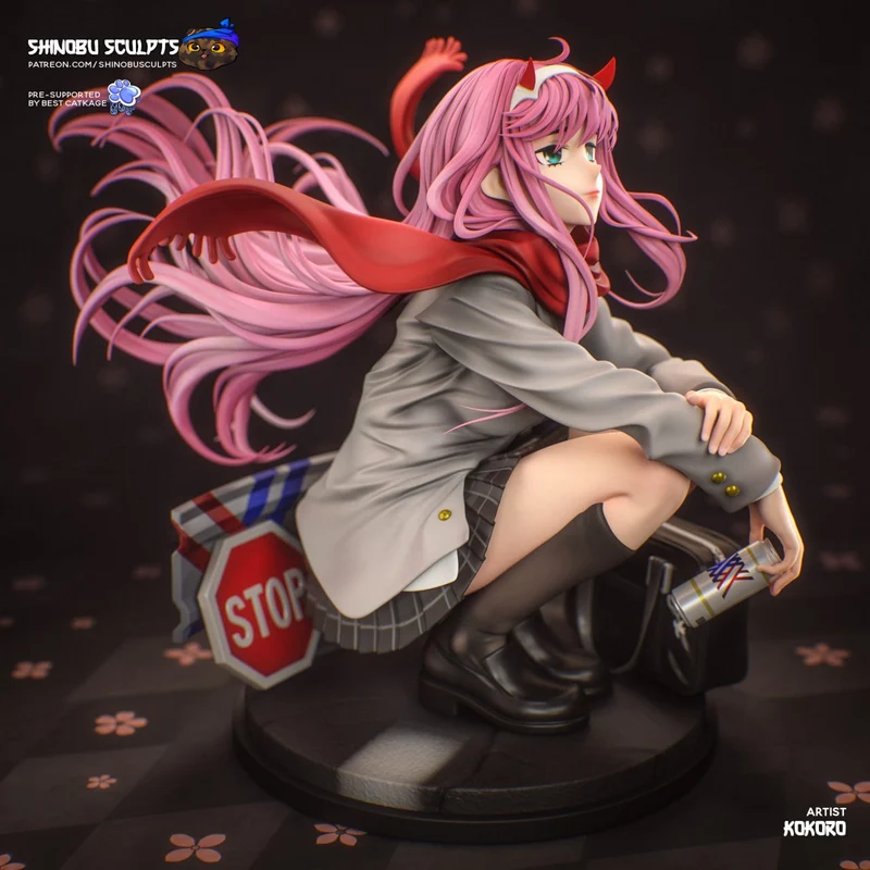 Zero Two seated anime figure with pink hair, horns, red scarf, and display base