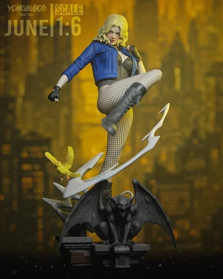 Black Canary statue in a dynamic pose with a yellow bird and gargoyle base