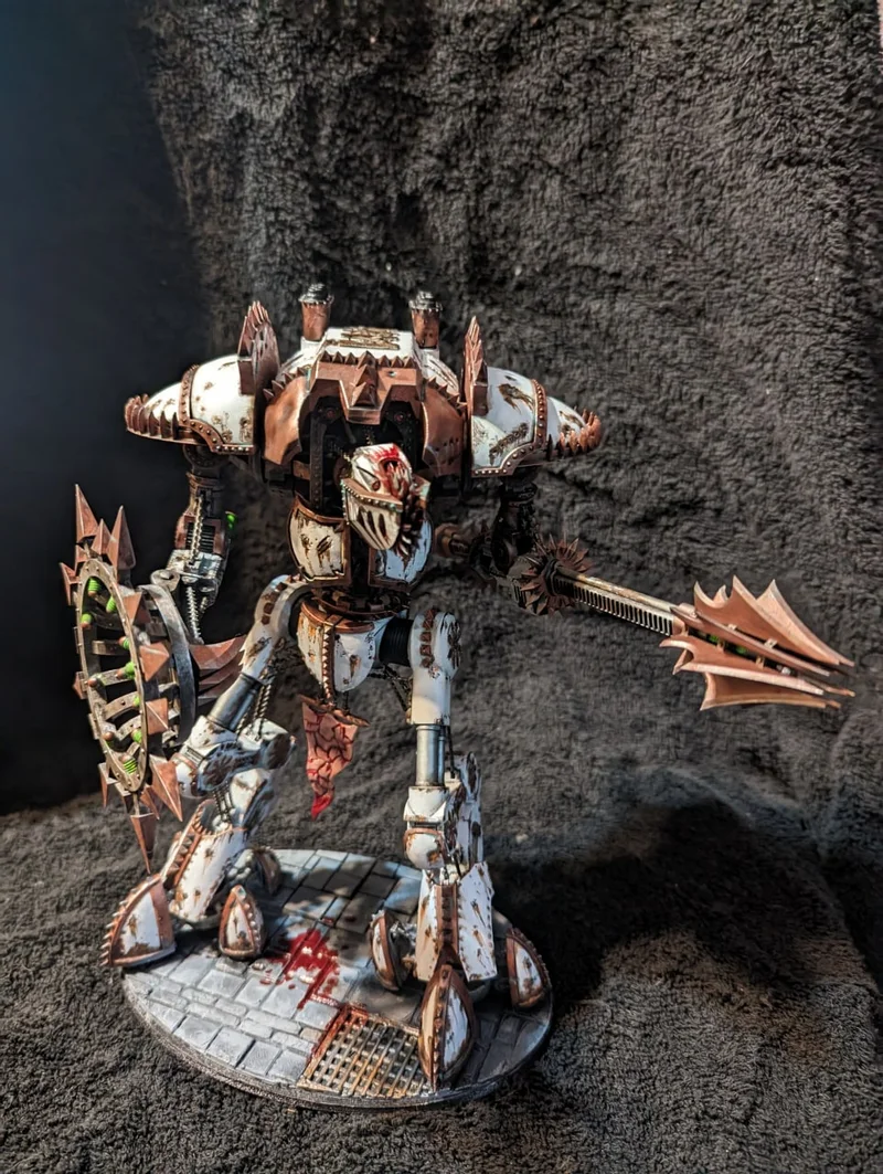 Armored fantasy impaler figure with spikes, weapons, and a round display base
