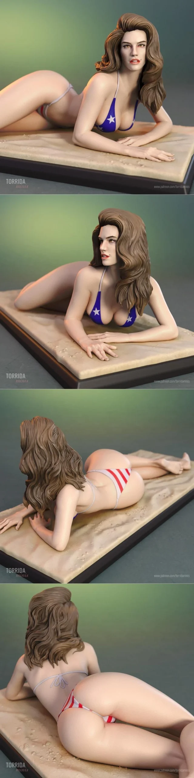 Reclining Cindy Crawford celebrity figure with flowing hair on a display base