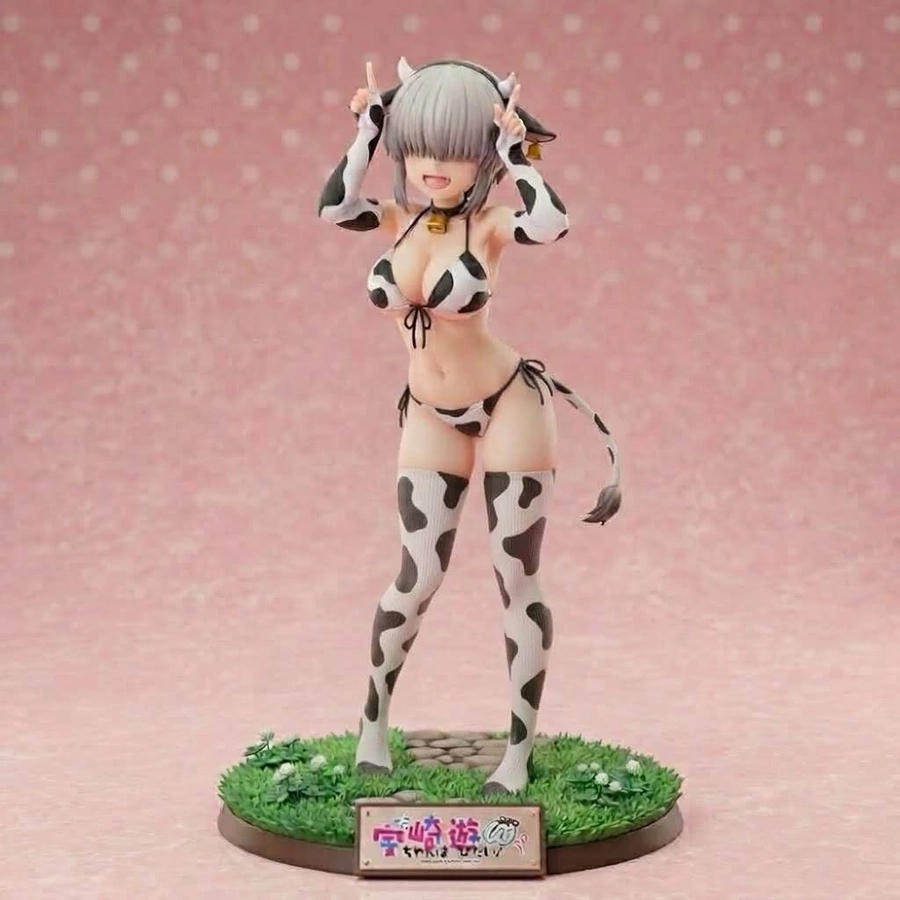 Yanagi Uzaki anime figure in a cow-pattern outfit on a round display base