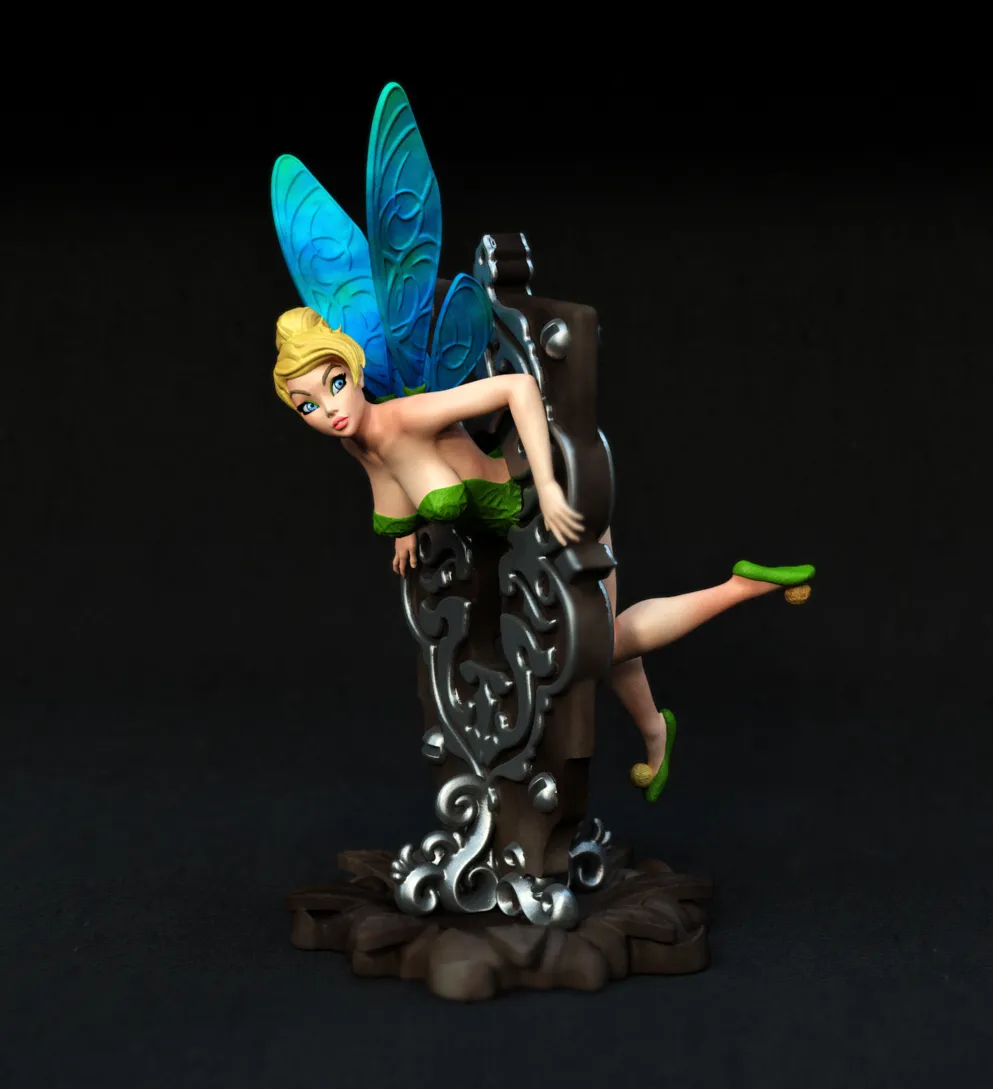 Tinker Bell Disney fairy figurine with blue wings and ornate dark decorative base