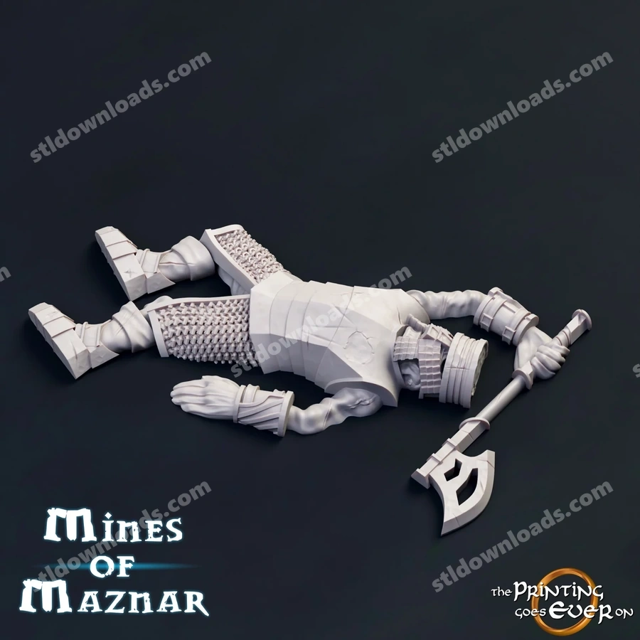 Fallen armored fantasy warrior miniature holding an ornate axe