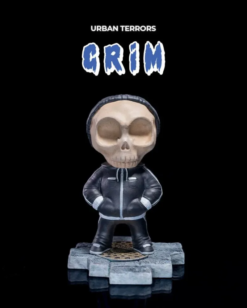 Grim skull-headed character in a hoodie on an urban display base