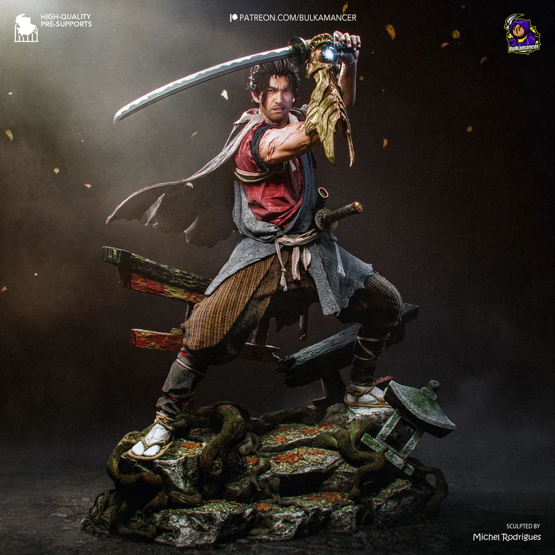 Samurai warrior statue with raised katana, layered robes, and rocky display base