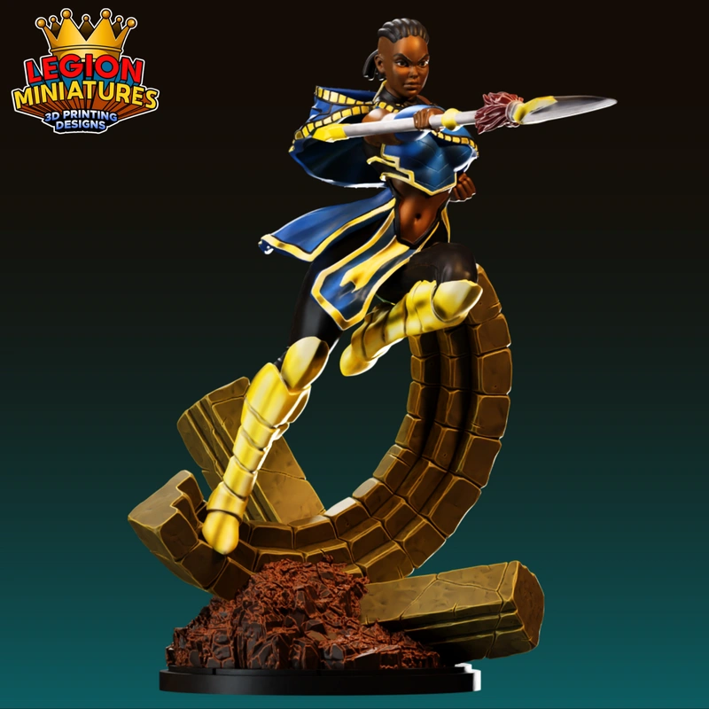 Shuri Marvel warrior statue in blue and gold armor holding a spear